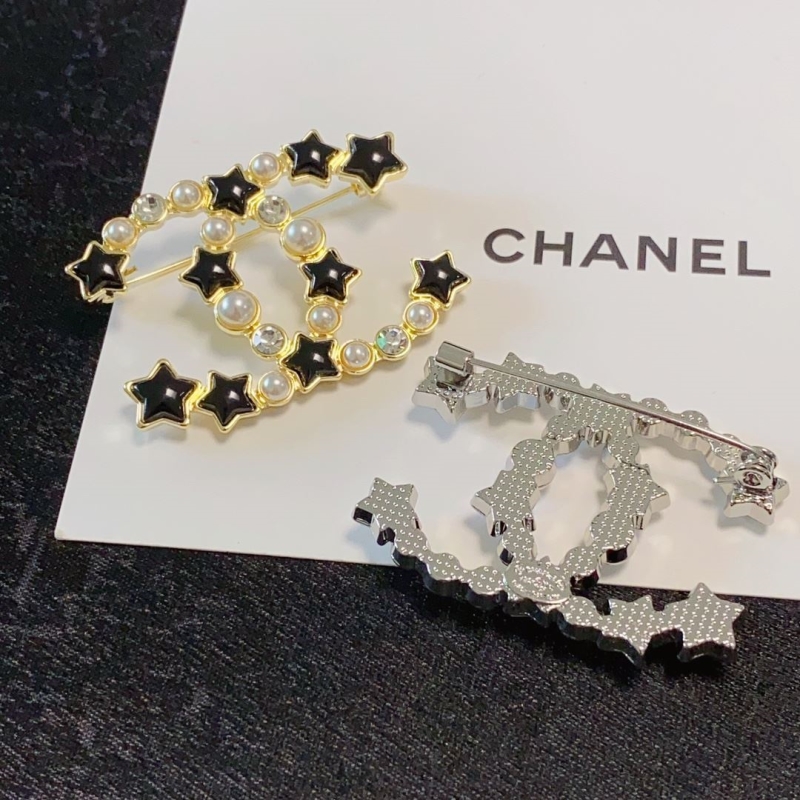 Ch**el brooches